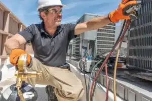 an expert doing hvac installation