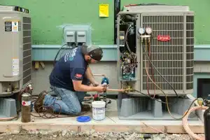 an expert doing hvac installation